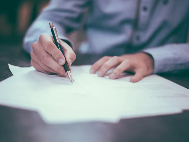 Attorney reviewing closing documents